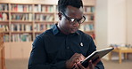 Tablet, library and black man with researcher and study at university or college with reading. Education, working and knowledge with website, thinking and app with professional online on internet