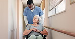 Push, nurse talking or old woman in wheelchair in hospital for healthcare help, results or support in clinic. Injury, elderly or patient with a disability or senior care for rehabilitation or advice