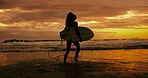 Running, silhouette and woman with a surfboard, beach and water with fitness, adventure and holiday. Person, girl or surfer with ocean or seaside with clouds or summer with vacation, sunset or nature