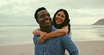 Piggyback, smile and couple at beach on holiday, vacation or travel for romantic date together. Love, happy and interracial young man and woman hugging and having fun by ocean or sea on weekend trip.
