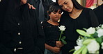 Funeral, family and woman with child at coffin with flower at memorial service at church in respect, support and comfort. Death, grief and widow with daughter, rose and goodbye at casket for farewell