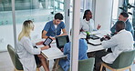 Medical, team and discussion for healthcare in conference room with technology, top view and meeting. Collaboration, doctor and nurse group in boardroom for surgery brainstorming and health planning