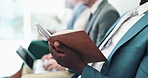 Business people, hands and meeting in row with book for notes, presentation or waiting room at the office. Closeup of businessman or employee reading notebook in line for knowledge at the workplace