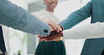 Business people, hands together and meeting with team in huddle, motivation or collaboration at office. Closeup of group or employees piling for unity, synergy or solidarity in diversity at workplace