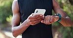 Black man, fitness and smartphone with watch in nature for exercise, workout and tracking time. Athlete, training and technology outdoors for sports, schedule and check for progress in forest