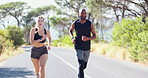 Friends, running and training by cardio on street, active and performance for fitness outdoors. People, road and workout challenge for health, support and together for exercise or sports in nature