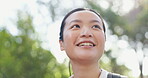 Hiking, breathing or woman thinking in nature, park or woods for vacation, break or holiday adventure. Relax, face or happy Asian person in forest for fresh air for travel, trekking or wellness