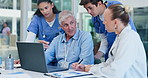 Staff, teamwork or medical with laptop, conversation or online reading for research or hospital. Group, healthcare or professional with computer or website info with cooperation, clinic or technology