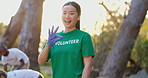 Happy, asian woman and volunteer with ok sign for community service or outdoor recycling in nature. Portrait of female person with smile, like emoji or okay gesture in NGO or eco friendly environment