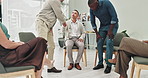 People, group therapy and together in circle at meeting with handshake, welcome and respect with kindness. Men, woman and shaking hands for psychology, support and introduction with chair in huddle