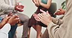 Support, circle and hands with applause in therapy for compassion, sympathy or understanding of mental health. Closeup, people or counseling session with clap for team building, kindness or diversity