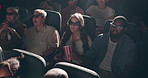 People, movie and glasses in 3D theater with popcorn in crowd, thinking and relax in night with group. Person, corn and fast food in cinema for film festival, screening and watch in audience for show