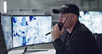 Man, walkie talkie or talking with cctv monitor for protection, security service or building safety at night. Face, video surveillance agency or guard in control room with footage or camera for crime