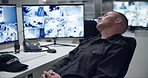 Computer, security and tired man with surveillance on screen for protection, safety and service in building. Law enforcement, sleeping and person in control room for crime, inspection and monitor