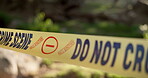 Police, yellow line or crime scene in outdoor for emergency, homicide or restricted area for investigation. Barricade, no entry or prohibition sign for public or forensic tape for accident or caution