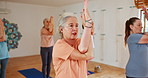 Senior woman, class and coaching with yoga for zen, spiritual wellness or balance together at home. Elderly people or yogi group in pilates, training or workout for exercise, fitness or health on mat