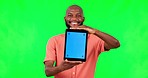 Black man, tablet and mock up with green screen and chroma key for advertising and promo. Young male person, portrait and digital technology with social media announcement and smile showing tech