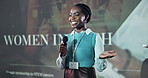 Happy black woman, business and presentation at conference for technology, seminar or workshop. Summit, talking or professional at event for speech, ideas and programmer with microphone in auditorium