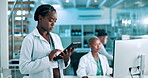 Black woman, lab and scientist with tablet for results or research as healthcare worker. Female person, hospital and browse website for information or treatment guidelines, database and schedule 
