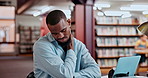 Tired, black man and student in library with pain, fatigue and learning for university education with laptop. Books, research and exhausted person at table for college project with elearning burnout