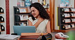 Library, neck pain or woman with stress, burnout or fatigue on laptop at university, school or college. Frustrated, overworked or tired student working with sore shoulder, muscle tension or injury