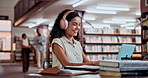 Headphones, dancing or woman in a library on laptop for knowledge, elearning or research in college. Online course, streaming music or happy university student studying information with scholarship