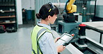 Woman, tablet and engineer with machine for production, industry 4.0 with robot arm and software for process. Tech, futuristic and digital remote control for automation, manufacturing and maintenance