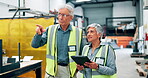 Senior, people and discussion with tablet on construction site with safety gear for civil or mechanical engineering. Managers, planning and digital technology for design, field inspection and info