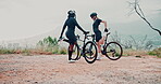 Cyclists, stretching and women in nature with bicycle or bike for sports, training and exercise. Forest, fitness and female people in woods for workout in environment together as friends with energy