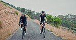 Female friends, cycling or fitness as travel in countryside as adventure, training or workout. Women, bikes or equipment on mountain path to balance, ride or bonding together on weekend getaway