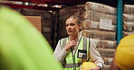 Talking, safety and woman in construction at warehouse with information, feedback and communication for team. Professional, worker and discussion of industry planning or process of storage in factory