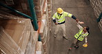 Engineer, team and dancing with high five at warehouse in success, winning or achievement together. Man and woman touching in victory, completion or finished with stock, inventory or storage at depot