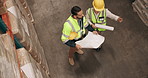Man, team and blueprint with architect in warehouse for construction, planning or inspection above. Top view of male person, engineer or contractors with document, paperwork or floor plan at depot