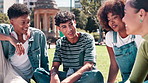 Friends, happiness and relax on grass with conversation on break, diversity and bonding with communication. Funny, students and speaking or talking on field at university for knowledge and education