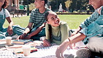 Students, happiness and relax on campus with conversation on break, diversity and bonding with communication. Funny, friends and grass or field at university for study group with books and education