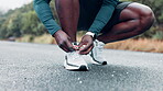 Runner, hands and shoelace for male athlete, mist and nature for workout on road in morning. Fitness, outdoor and marathon training for wellness and cardio exercise, shoes and footwear for sports 