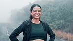 Woman, portrait and exercise outdoor with smile for wellness, running or hiking with cardio in nature. Happiness, fitness and sports training for health, fresh air and athlete with pride in workout