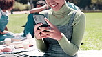 Happy woman, student and hands with phone at university for social media, communication or networking in nature. Closeup of female person with smile on mobile smartphone for online chatting at park