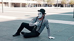 Mime artist, drunk and outdoor with creative, performance and acting out a story with skills and body motions. Alcohol, person and performer with theatrical medium and performance with expression