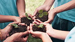 Hands, volunteers and team soil for plant growth, nonprofit and earth day in outdoor nature. People, closeup and sustainability or accountability for climate change, solidarity and collaboration