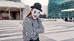 City, emotion and face of mime for funny joke, humor and crazy facial expression with crossed arms. Theatre, street performer and portrait of man in costume for performance, entertainment and comedy