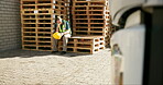 Construction worker, rest and break for frustration, exhaustion with wood pallet and ppe. Engineer, stress and burnout with industrial headache, professional fatigue and doubt for renovation site