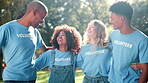 NGO, hug and smile with group, nature and environmental care for cleanup. Volunteers, teamwork and support for sustainable, recycling and green collaboration for charity service or earth day project