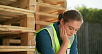 Stress, engineer and person at construction site with depression, frustrated and thinking of serious mistake outdoor. Woman, architect and worker with fatigue, tired and burnout for building crisis