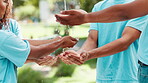 Splash, friends and waterfall on hands outdoors for hydration or cleanliness, wash and wellness in environment. Liquid, h2o and pour or flow for sustainability or refreshing with nature on earth day.