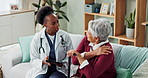 Elderly, woman and doctor with consultation for shoulder pain with tablet, explaining symptoms or medical advice. Senior patient, nurse or discussion in nursing home, osteoporosis or top view on sofa