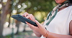 Park, hands and business woman on tablet for creative research and reading blog online. Nature, career and closeup of female designer scroll on digital technology in outdoor field or garden.