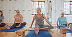 Fitness, yoga and mature women stretching in class for wellness, healthy body and workout on floor. Retirement, pilates and elderly people on sports mat for exercise, warm up and training together