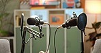 Studio, podcast and microphone or empty room for live streaming broadcast, entertainment or social media. Equipment, technology and recording talk show for radio service, creative or subscription