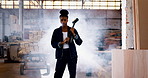 Tools, construction and face of woman in warehouse for engineering, distribution and building. Dust, factory and portrait of person with sledgehammer for production, infrastructure and manufacturing